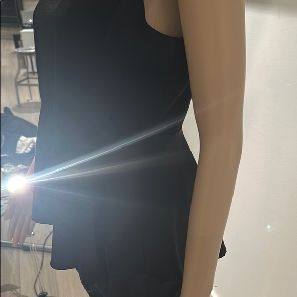 Black Sleeveless Peplum Blouse with Embellished Shoulders - Picture 5 of 7